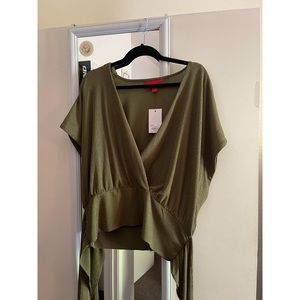 Olive green cross body front with tie in back.